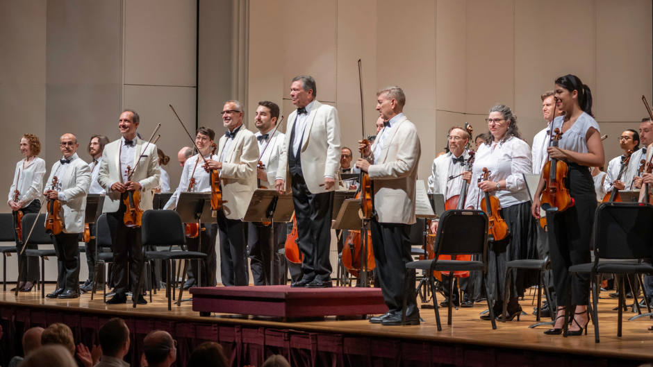 Gerard Schwarz taking a bow with the Eastern Music Festival Orchestra. Photo credit: Lynn Donovan