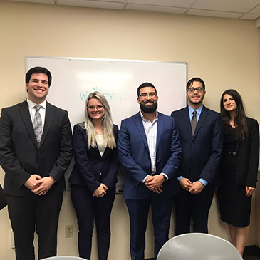 Miami Law team with Zacarias Quezada, J.D. / LL.M. '16, in the middle