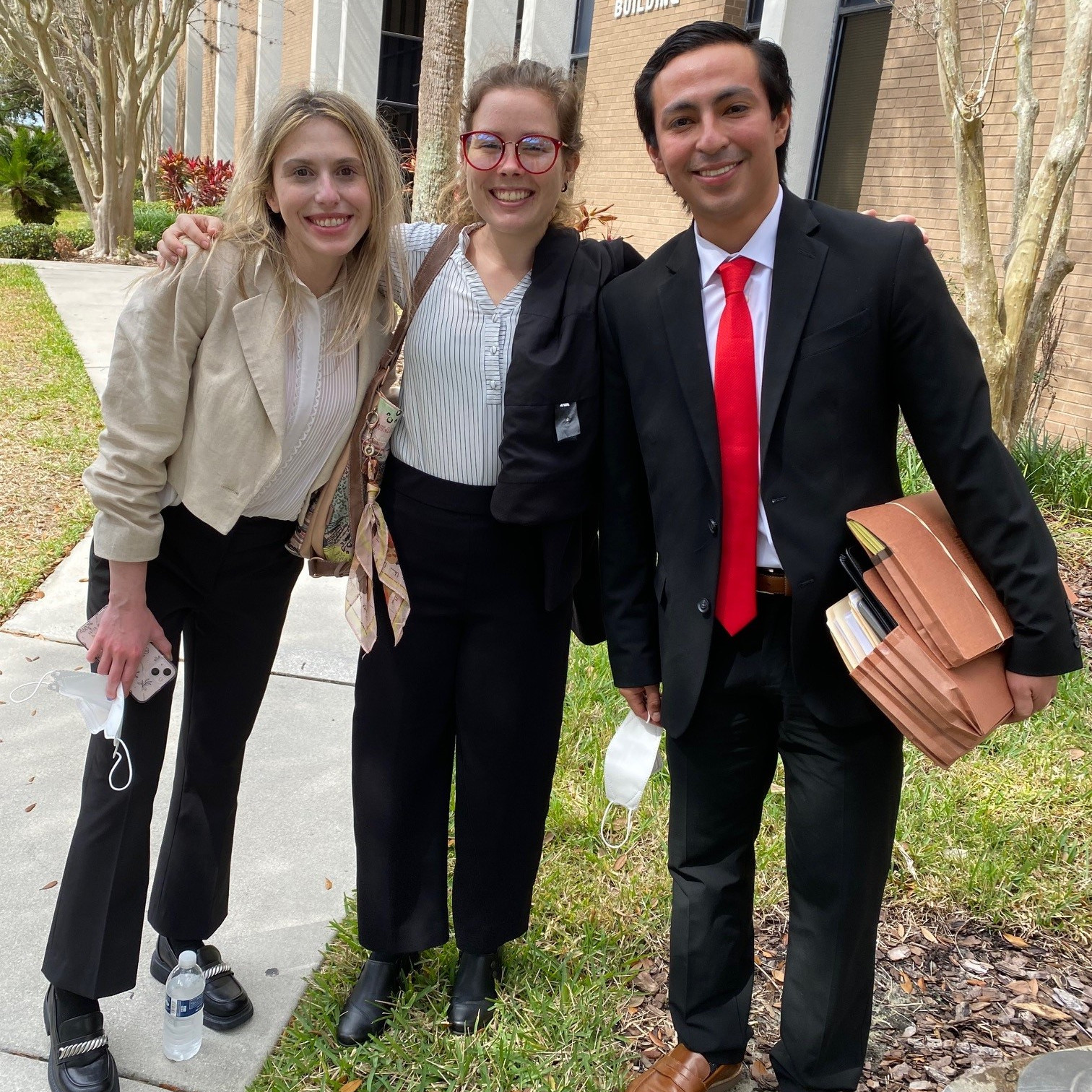 Immigration Clinic students Ashley Plotkin, Abbey Schultz, & David Mancia-Orellana