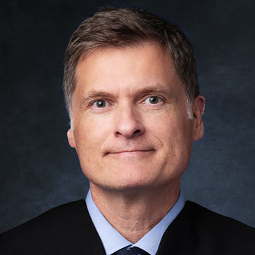 Robert B. Cole Lecture Series hosts centennial fireside chat with Florida Chief Justice Carlos G. Muñiz