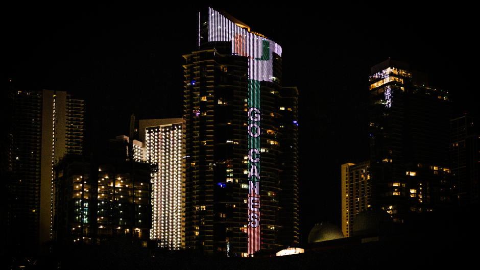 Illuminating downtown Miami with an orange and green glow